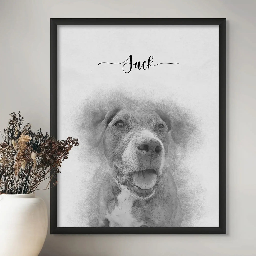 Sketch-style portrait of a dog with its mouth open, named Jack, in a black frame beside a vase of dried flowers